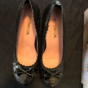 Ten Thirty-One black glitter heels.